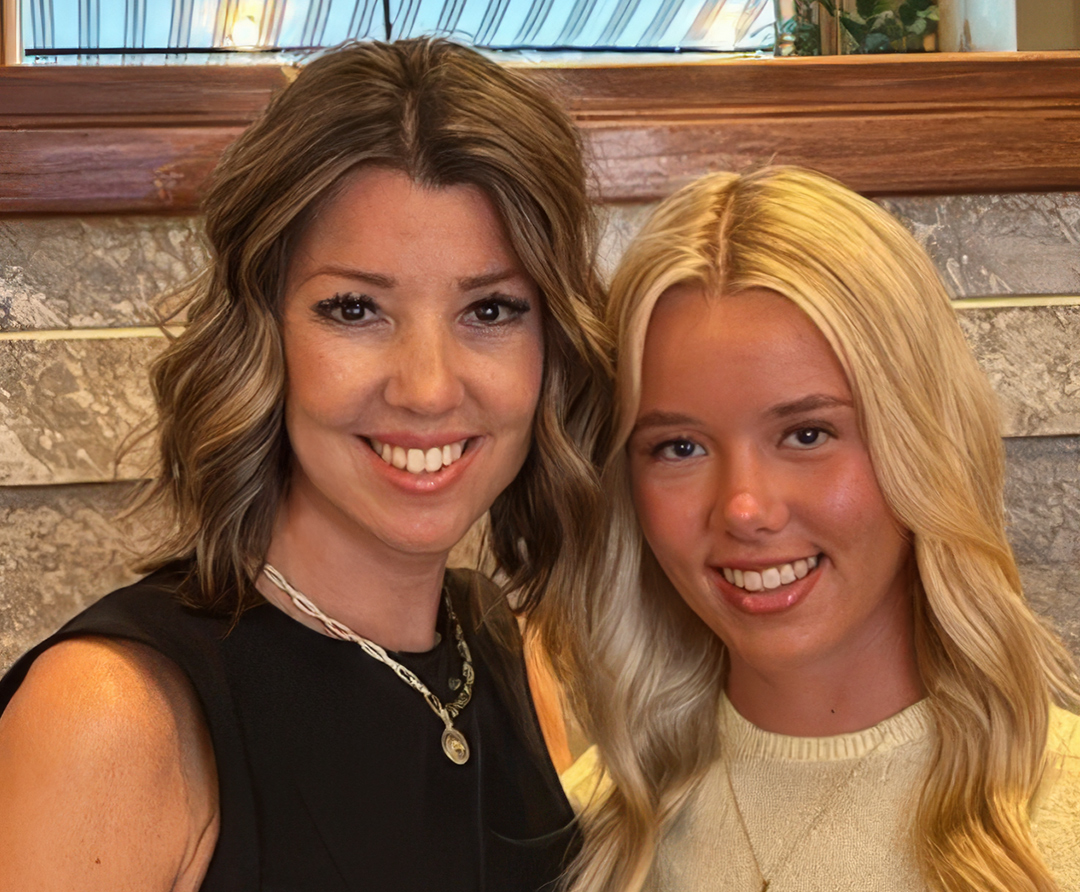 Two smiling women